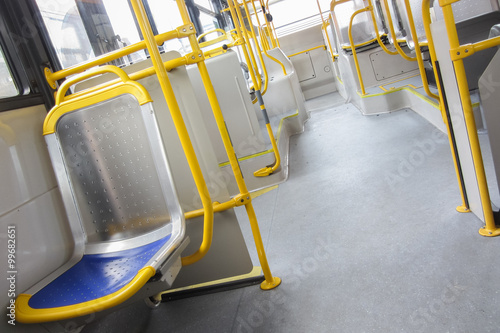 empty seat inside a city bus © TPhotography