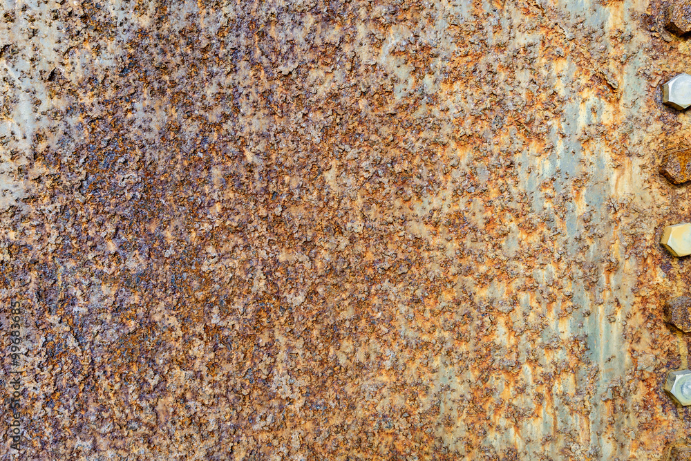 Rusted metal surface and screw nut Rusted metal surface and screw nut