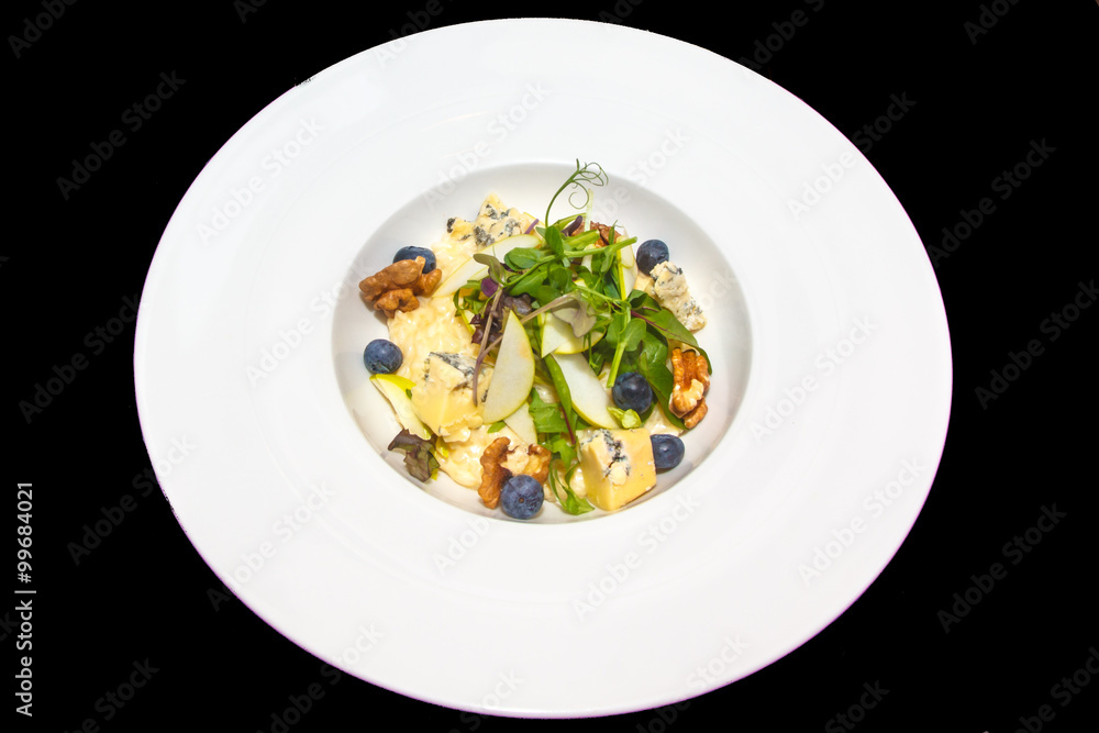 Risotto with Gorgonzola, walnuts, blueberries and sprouts of gre Risotto with Gorgonzola, walnuts, blueberries and sprouts of gre