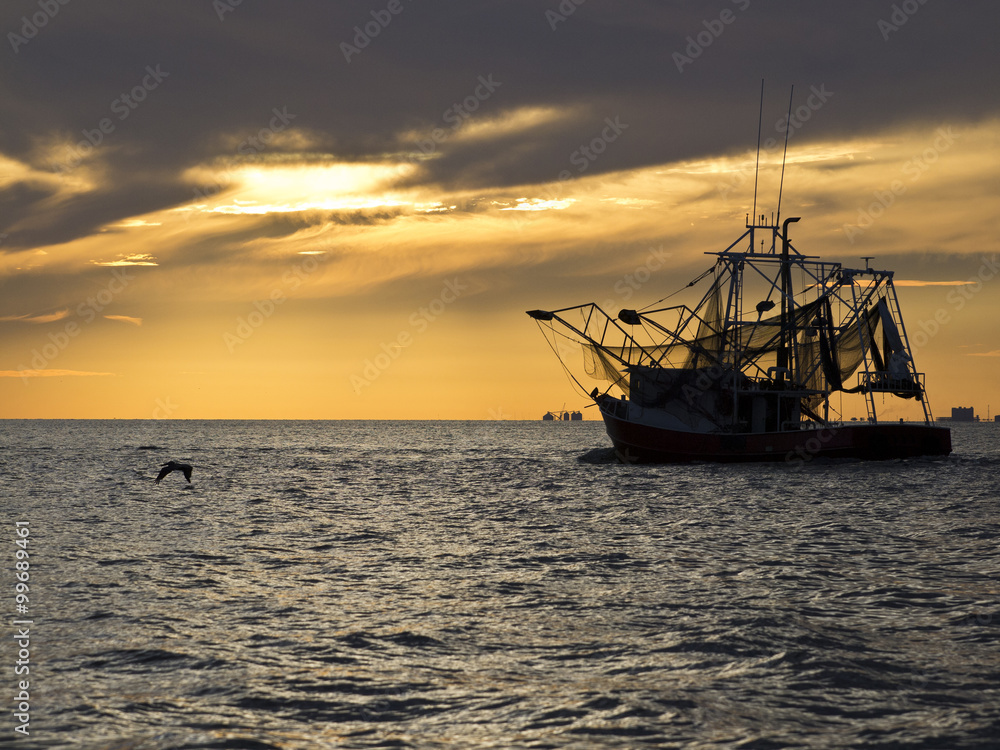 Shrimping boat leaving to shrimp Shrimping boat leaving to shrimp