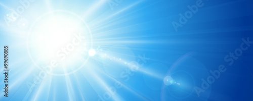 Blue sky with sun and lens flare