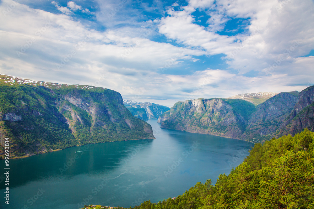 Aurlandsfjord landscape with blue sky and clouds, Norway.