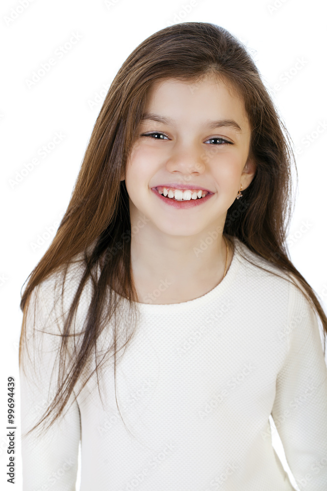 Portrait of a charming little girl smiling at camera Portrait of a charming little girl smiling at camera