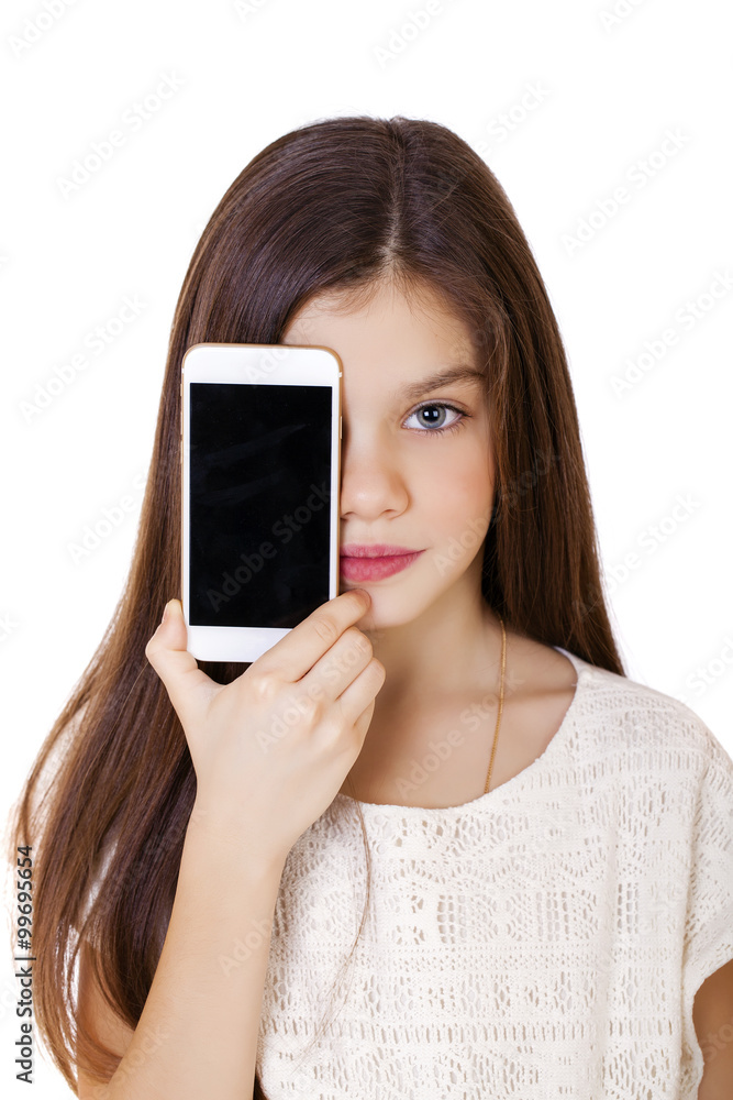 Happy little girl covers her face screen smartphone Happy little girl covers her face screen smartphone