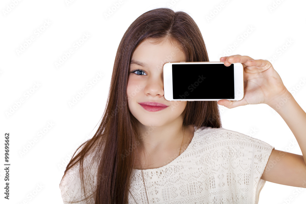 Happy little girl covers her face screen smartphone Happy little girl covers her face screen smartphone