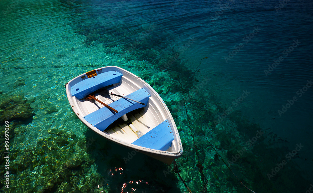 Boat in blue water