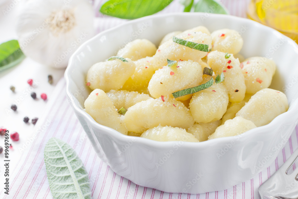 Italian gnocchi with sage leaves and olive oil Italian gnocchi with sage leaves and olive oil