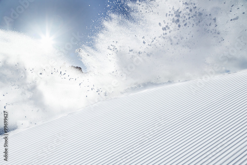 Skier skiing downhill in high mountains © Lukas Gojda