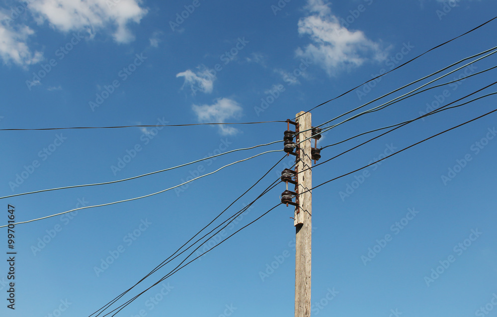 top of electrical wooden pole against the sky top of electrical wooden pole against the sky