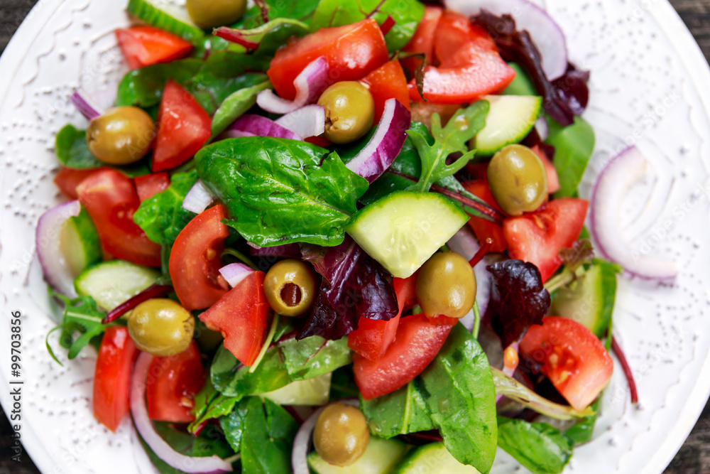 Fresh raw Vegetable mixed salad. close up view from top. Fresh raw Vegetable mixed salad. close up view from top.