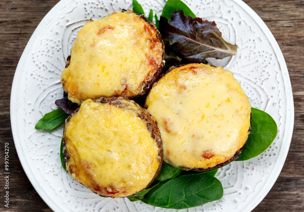 Cooked Mushrooms with vegetables and cheese Cooked Mushrooms with vegetables and cheese