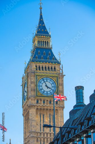 The Union Flag flying in front of the clock tower Big Ben, Palace of Westminster. London UK photo