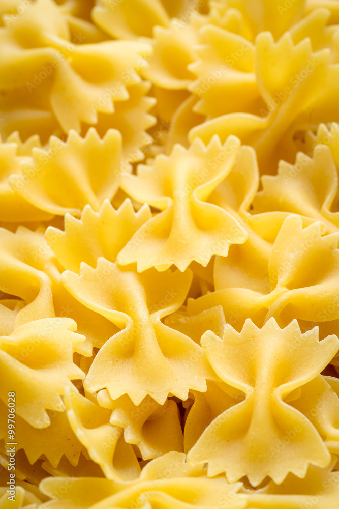 Close-up view of uncooked farfalle pasta. Close-up view of uncooked farfalle pasta.