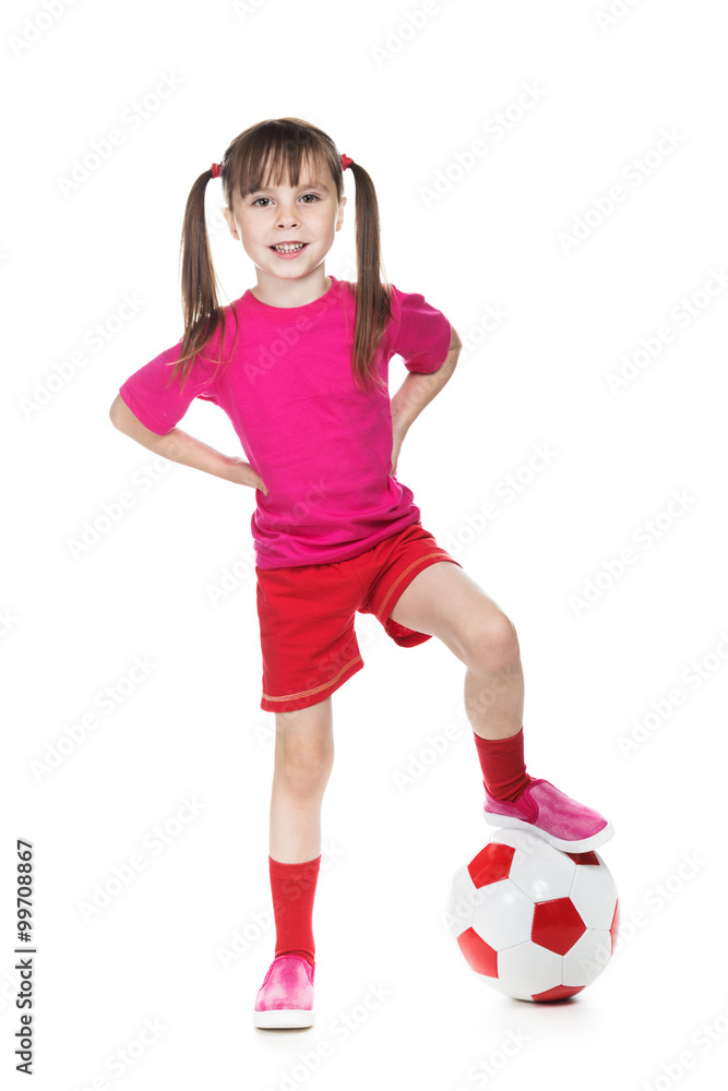 Little girl football player.