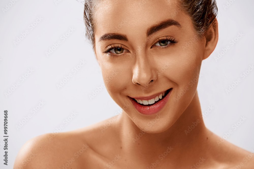 Attractive young woman with a lovely smile Attractive young woman with a lovely smile