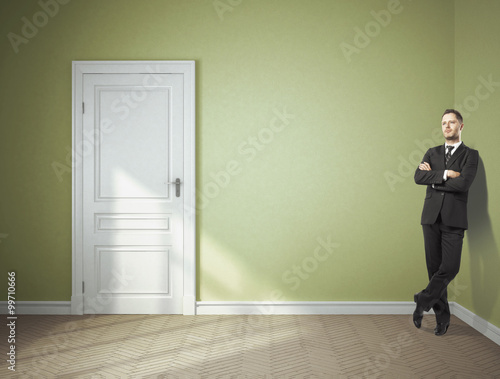 businessman in green room