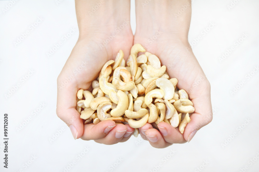 Obraz premium hands with nuts