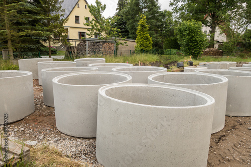 Drainage pipes, concrete stacked for construction.