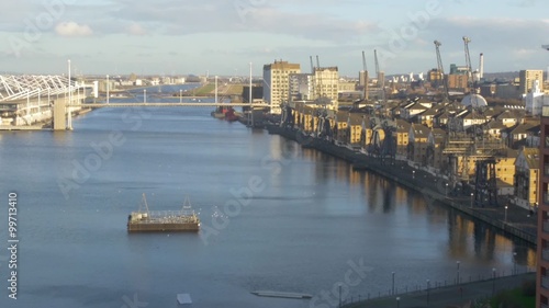 Dolly view of the Royal Victoria Dock and the Excel Exhibition center in London photo