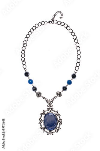 necklace with blue gem on a white background