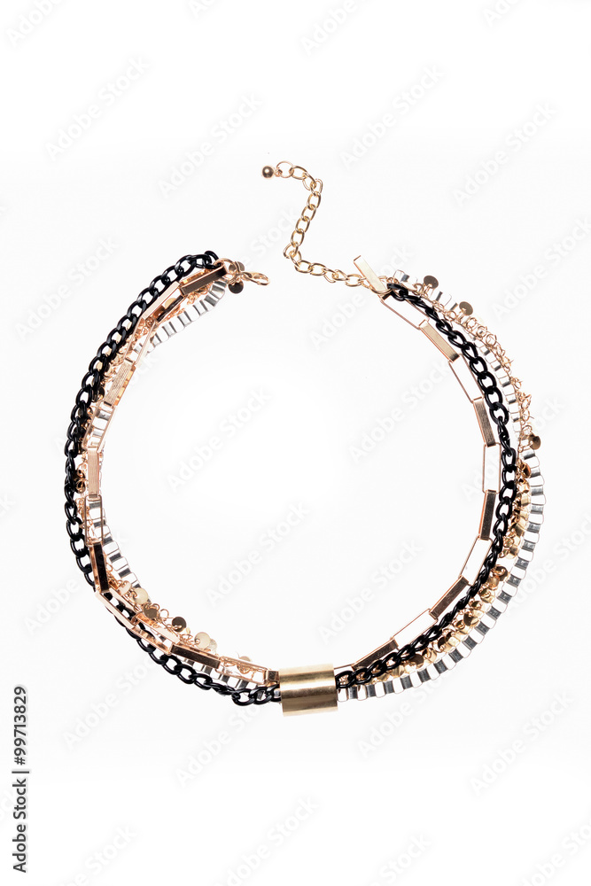 gold necklace on a white background gold necklace on a white background
