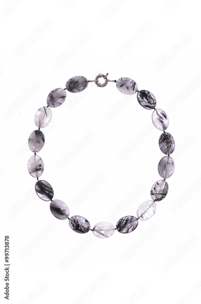necklace with beads and stones on a white background necklace with beads and stones on a white background