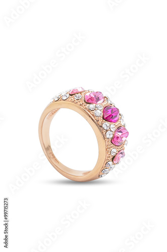 gold ring with pink stones on a white background