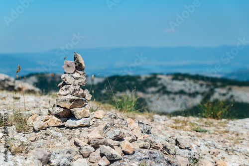 Cairn on top of a mountain © Vladimir Muravin