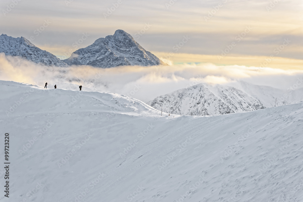 People at the top of Kasprowy Wierch in Zakopane in Tatras in winter