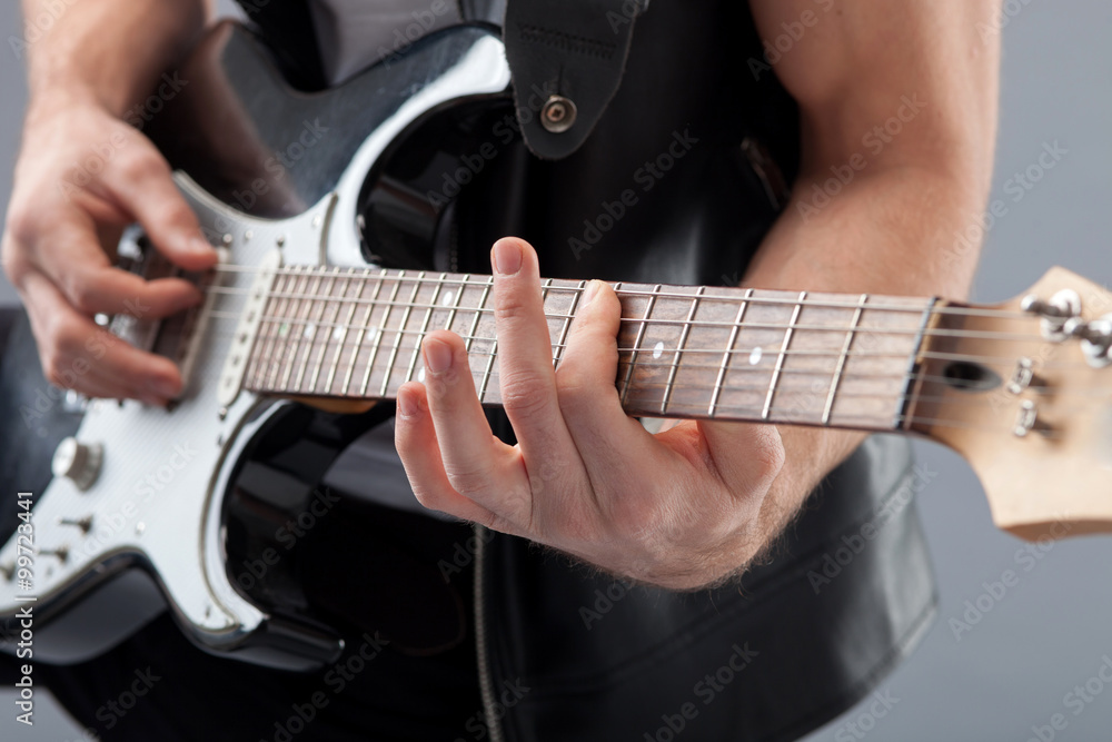 Fototapeta premium Skillful young musician is making great performance