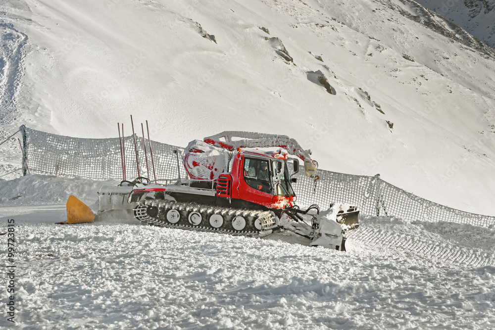 Ratrack at work on the top of Kasprowy Wierch in Zakopane in winter Ratrack at work on the top of Kasprowy Wierch in Zakopane in winter