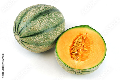 fresh cantaloupe melon on white background