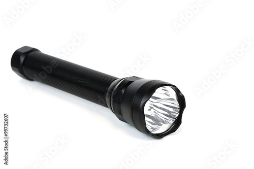 LED flashlight on white background photo
