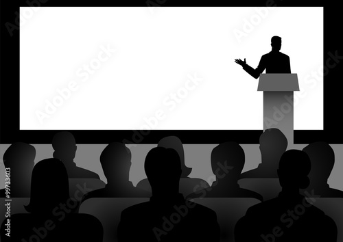 Man Giving A Speech On Stage