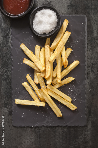 French Fries with Sea Salt on Black Slate
