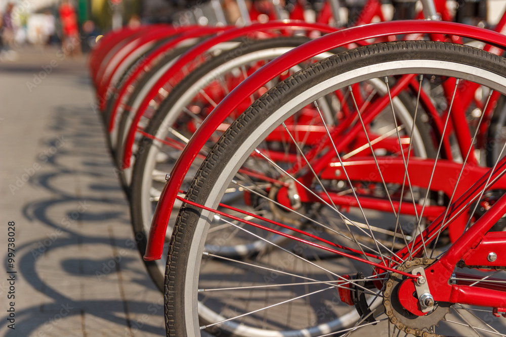 red bicycles parked in the city