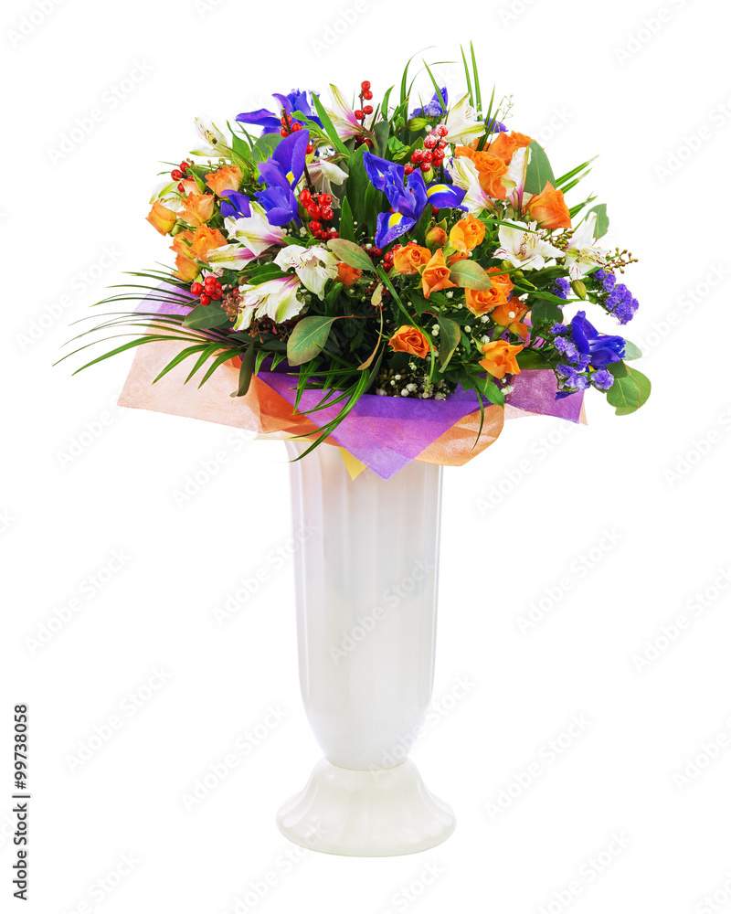 Bouquet of roses, iris, alstroemeria, nerine and other flowers.