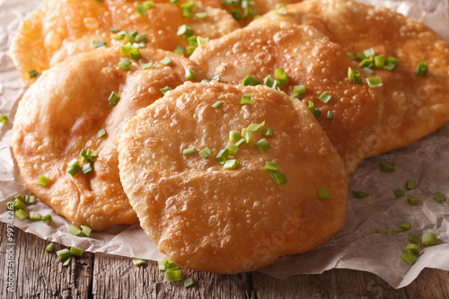 Indian puri bread macro on the table. Horizontal
