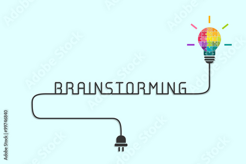 Brainstorming concept with lightbulb made of puzzle pieces