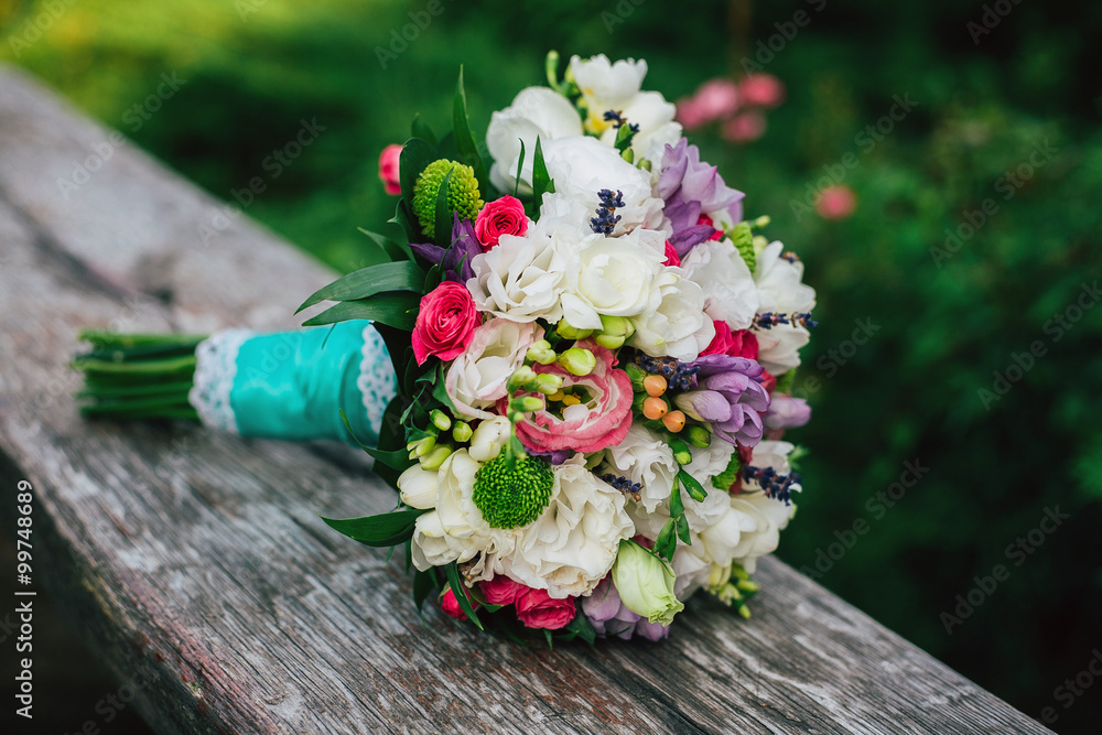 bridal bouquet with red, white flowers