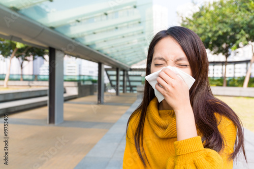 Asian Young Woman runny nose © leungchopan