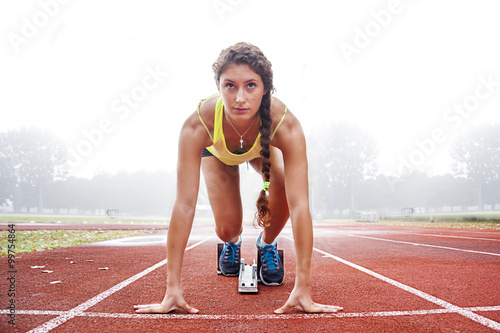 athlete on the starting blocks photo