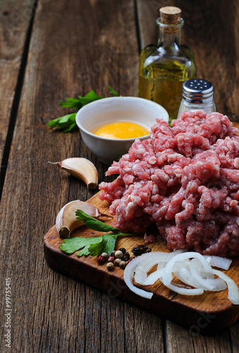 Raw minced meat with olive oil and garlic