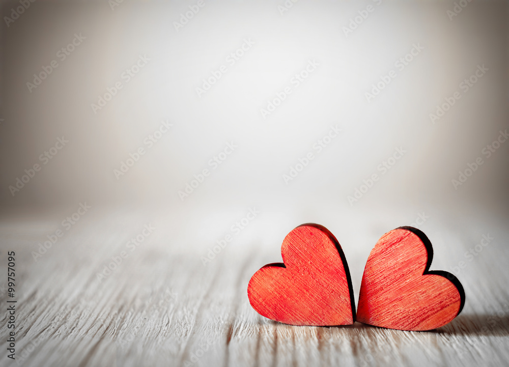 Valentines day background with two red hearts on wooden background - obrazy, fototapety, plakaty 