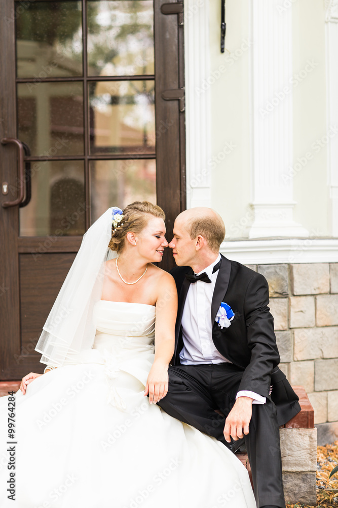 Fototapeta premium Happy bride and groom on their wedding
