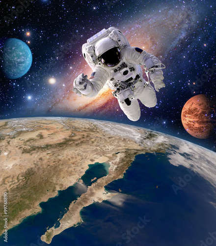 Astronaut spaceman solar system planet spacewalk earth outer space walk galaxy. Elements of this image furnished by NASA.