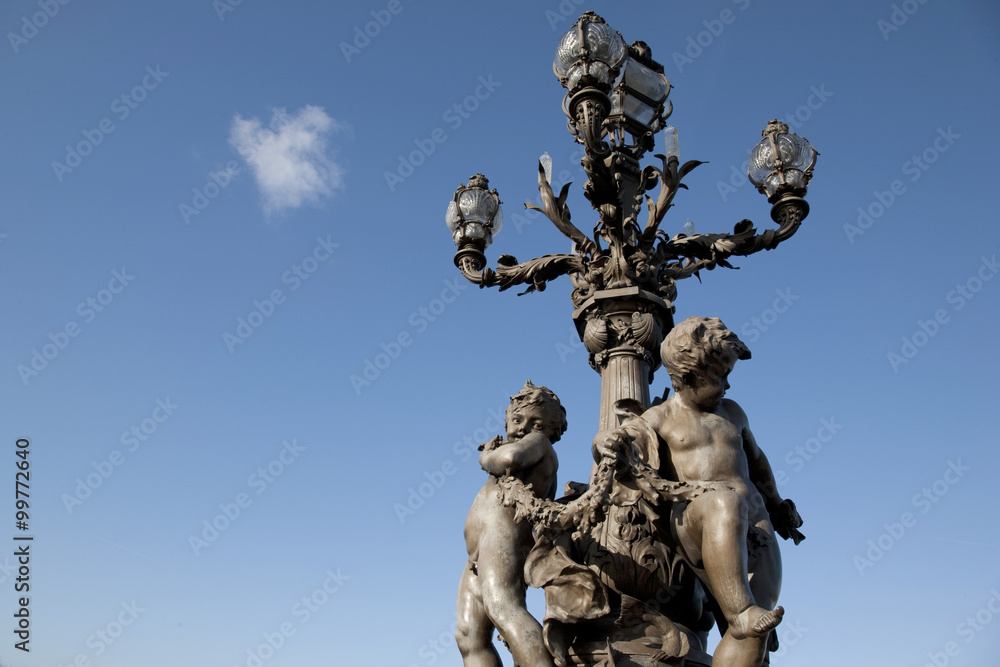 Figures on Pont Alexandre III Bridge in Paris, France Figures on Pont Alexandre III Bridge in Paris, France