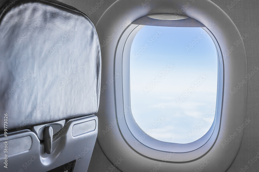 view from an airplane window at the sky view from an airplane window at the sky