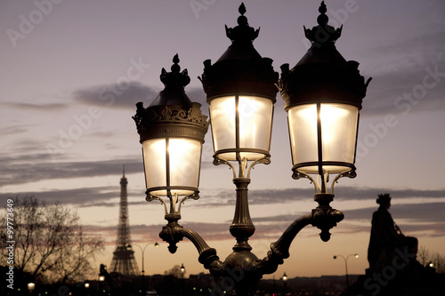 Eiffel Tower illuminated at night in Paris, France
