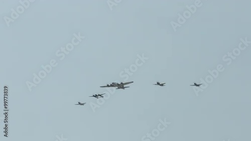 Wallpaper Mural B-17 Flying Fortress leads a formation of World War II fighter planes, including a P-63 Kingcobra, a P-38 Lightning, and two P-51 Mustangs.  Recorded in 4K, ultra high definition.  Torontodigital.ca